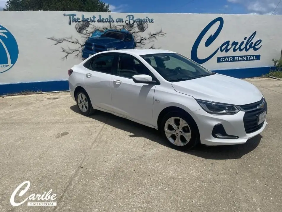 Caribe car rental bonaire chevrolet sedan right side view